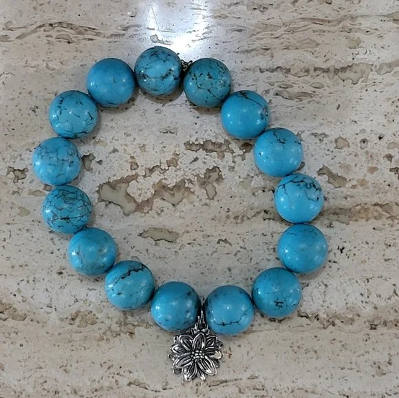 Blue Howlite 14mm Bead Stretch Bracelet With Silver Flower Dangle Charm - Picture 2 of 7